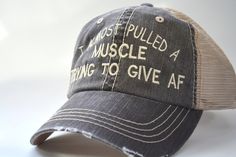 I Almost Pulled A Muscle Trying To Give AF distressed truckers hat Funny saying cap women's Unisex Cap Funny Gift Friend Gym Hat Fitness ⇝ IF YOU WOULD LIKE TO GET THE SAYING IN MULTIPLE COLORS PLEASE LEAVE A NOTE AT CHECKOUT. Low Profile Special Cotton Mesh Trucker Caps 6-panel, front/cotton, and back/mesh. Bill measures 3 inches long, pre curved and frayed. ONE SIZE fits most with adjustable velcro strap closure, fitting up to XL. Please NOTE : I'm sorry but due to the personalized nature of t Distressed Gray Cap, Gray Distressed Cap, Distressed Trucker Hat With Curved Brim, Distressed Trucker Snapback Hat, Distressed Snapback Trucker Hat, Outdoor Distressed Trucker Hat, Distressed Trucker Hat One Size Fits Most, Distressed Trucker Baseball Cap, Distressed Trucker Hat For Outdoor