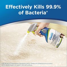 a person using a sprayer to clean carpet with the caption effective kills 99 % of bacteria