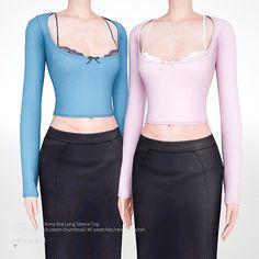 two female mannequins are standing next to each other wearing skirts and bra tops