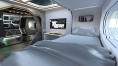 the interior of a futuristic looking bedroom with white sheets