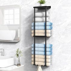 a bathroom with a towel rack on the wall