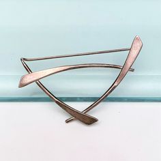 "This is a fun Mid Century modernist brooch by Ed Levin. The piece is signed and marked Sterling. The brooch is in very good vintage condition with no serious wear or visible flaws. The brooch measures 2\" wide, 1.5\" long and weighs .1 Troy ounce. If you have any questions or would like to see additional pictures, please contact us before making your purchase. Buyers outside the United States, please contact us for a shipping estimate." Brooch Pin, Brooches, Bangles, Mid Century, United States, Sterling Silver, Silver