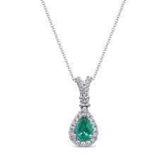 Sparkling diamonds accentuate the lush hue of natural emerald in this luxuriant necklace from Natural Precious Gemstones by KAY. Crafted in 14K white gold A pear-shaped emerald drop is framed by dazzling round-cut diamonds More round diamonds decorate the split bail Total diamond weight is 1/2 carat The pendant suspends along an 18-inch cable chain that secures with a lobster clasp Diamond Drop Necklace, Diamond Drops, Accessories Jewelry Necklace, Drop Necklace, Emerald Diamond, Natural Emerald, 2 Carat, Precious Gemstones, Sparkle Diamonds