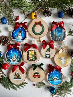 christmas ornaments are arranged on a table