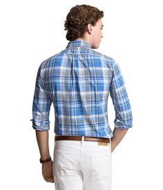 Take your weekend style to higher limits with the Polo Ralph Lauren® Classic Fit Plaid Oxford Shirt. The classic-fit shirt is crafted from a lightweight Oxford woven in a versatile plaid design..Button-down collar..Long sleeves with buttoned cuffs..Signature pony player embroidery at the left chest..Full button-down front closure..Straight back yoke with a center box pleat..Shirttail hemline..100% cotton..Machine wash, tumble dry..Imported..Product measurements were taken using size MD. Please note that measurements may vary by size..Measurements: Length: 29 in Straight Back, Weekend Style, Plaid Design, Oxford Shirt, Ralph Lauren Shirt, Polo Ralph Lauren Mens, Workout Shirts, Polo Ralph, Top Shirt