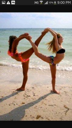 two girls doing yoga on the beach with caption for anni @ alohnes1