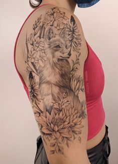 a woman with a tattoo on her arm