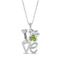 Show how much you love your pet with this necklace that showcases pet paw & bone. Sterling Silver Round-cut peridots Round-cut white lab-created sapphires Personalize with name of your choosing 18-inch rope chain with spring-ring clasp Paw Necklace, Bone Dog, White Lab, Love Your Pet, Pet Paws, Dog Paw, Accessories Jewelry Necklace, Necklace Sterling Silver, Dog Paws