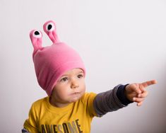 "Pink Polar Fleece Hat, Pink Snail Hat, Alien Hat, Halloween Costume, Easter Gift, Toddler Girl Hat, Toddler Boy Hat Here is a cute hat in pink. It may be a snail, it may be an alien - it is your choice what you make of it. Just had fun with this Small size fits kids 1 through 3 years of age approximately - Head Circumference: 18\" to 20\" (46 - 51 cm). Medium size will fit anyone with head circumference 20\" to 22\" (51 - 56 cm) Large size will fit anyone with head circumference 22\" to 24\" (5 Snail Costume, Toothless Costume, Alien Hat, Doctor Halloween, Hat Halloween Costume, Alien Costume, Pet Halloween Costumes, Fleece Hat, Wings Costume