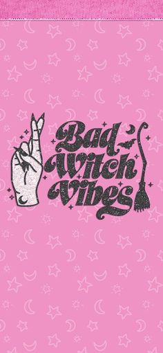 a pink background with the words bad witch wines on it and an image of a hand holding