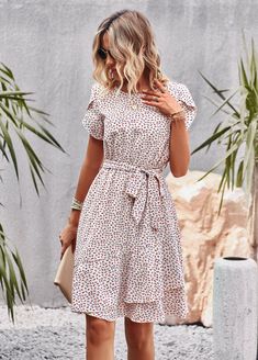 Our emiliana floral doll mini dress features a flattering, feminine silhouette with a round neckline, short sleeves, and a relaxed fit. The versatile design makes it perfect for a range of occasions, from picnics in the park to daily work. Whether you're dressing up or keeping it casual, this Floral Mini Dress is the ideal choice for fashion-forward women who love to stand out from the crowd. Size Guide: Sophia is 5’6” tall, and has a 33.2” bust, 26.4” waist, & 35.2” hips. She is wearing a S / U Modest Dresses For Teens, Modest Church Dresses, Beautiful Midi Dresses, Bible College, Round Neck Casual Dress, Petal Sleeve, Night Dresses, Clothes Wishlist, Summer Work