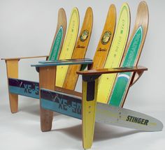 two wooden chairs made to look like surfboards