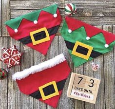 three christmas stockings with santa hats on them