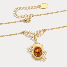 This Osmanthus Fragrans Pendant Necklace is an luxuriously exquisite piece. Handcrafted with beautiful enamel, it is an elegant accessory that will instantly upgrade any formal look. A timeless treasure, it is sure to become a cherished heirloom. DETAILS Plating: 18K Gold Materials: 18K Gold on Brass, Enamel, Artificial Gemstone Measurements: Length: 16.53"(42cm) + Extender: 2.56"(6.5cm) Weight: 13.7g Hypoallergenic design Yellow Gold Enamel Oval Pendant Necklaces, Luxury Gold Enamel Necklace, Gold Enamel Amulet Jewelry, Gold Enamel Pendant Necklace, Gold Enamel Locket Jewelry, Gold Enamel Jewelry With Locket, Luxury Gold Necklace With Flower Charm, Gold Necklace With Flower Charm On Oval Pendant, Gold Oval Pendant Necklace With Flower Charm