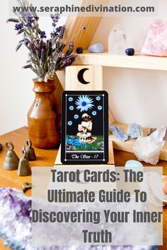 tarot cards the ultimate guide to discovering your inner truth with crystals and stones on a table