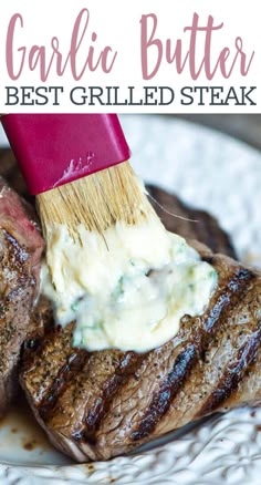 a piece of steak being brushed with a brush