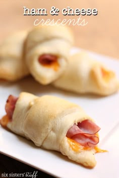 ham and cheese crescents on a white plate