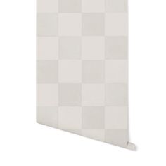 the textured material is white and grey checkerboard pattern on this wallpaper