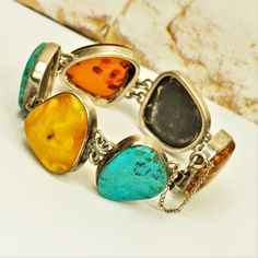 "HUGE BALTIC AMBER 925 Silver Panel Bracelet, Turquoise Heavy Link Bracelet, Rare Estate Amber Jewelry, Unique Gift Idea For Her Holiday Gift by ANTIQUE4YOU SO BEAUTIFUL STONES FILLED WITH SUN AMAZING COMPOSITION OF HUGE 3 GENUINE AMBER + 3 BLUE TURQUOISE FREE FORM STONES PLACED IN ARTISTIC STERLING SILVER FRAME. ESTATE AMBER. SECURED CLOSURE WITH CHAIN. STONES 1\" x 1 1/4\" each. In perfect conditions. LENGTH OF BRACELET 7.5\" HEAVYWEIGHT. UNISEX. THANKSGIVING GIFT FOR HER. CHRISTMAS GIFT. NEW Bohemian Sterling Silver Multi-stone Bracelets, Bohemian Multi-stone Sterling Silver Bracelets, Amber Jewelry, Jewelry Unique, 925 Jewelry, Baltic Amber, Silver Frame, Chain Link Bracelet, Link Bracelets