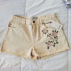 Beige Denim Embroidered Shorts. Embroidery Has Flowers In Front And Back Of Shorts. Very Cute Item, Size 8. This Is New With Tags. High Waist Cotton Jeans With Floral Embroidery, Casual Embroidered Cotton Jean Shorts, Casual Cotton Embroidered Jean Shorts, Summer Cream Bottoms With Floral Embroidery, Cream Floral Embroidery Bottoms For Summer, Summer Floral Embroidery Cream Bottoms, Summer Embroidered Cotton Jeans, Beige Floral Embroidered Bottoms For Spring, Spring Beige Floral Embroidered Bottoms