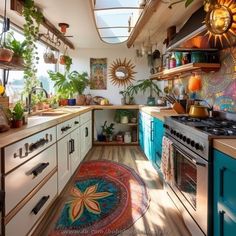 a kitchen filled with lots of counter top space next to a stove top oven under a skylight