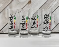 four glasses with the words happy birthday on them