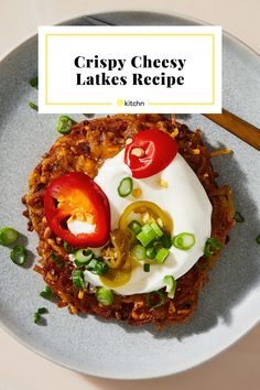 a plate with some food on top of it and a fork next to it,