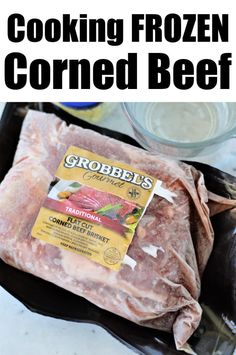 the ingredients for cooking frozen corned beef are shown in black plastic bags with text overlay