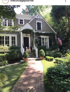 a dog is standing in front of a house