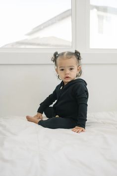 The Play Day romper is a one-piece perfect for all seasons. Mostly winter and spring. This romper features a hoodie and fully functional buttons easy enough for toddlers to put on and off. it is made off our popular super soft baby french terry fabric and makes the cutest little fit on both boys and girls.