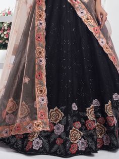 Step into elegance and grace with this stunning black color net lehenga embellished with intricate multi-embroidered work and delicate sequin detailing. The richness of the embroidery adds a regal touch, making it perfect for grand occasions like weddings, receptions, or formal gatherings. The semi-stitched lehenga offers versatility, accommodating up to 42 inches, ensuring a comfortable and flattering fit for various body types.
Complementing the lehenga is a net choli in a similar black hue, a Engagement Gown, Lehenga Crop Top, Floral Lehenga, Lehenga Choli Wedding, Party Wear Lehenga Choli, Reception Gown, Stitched Lehenga, Bollywood Lehenga, Cocktail Wear