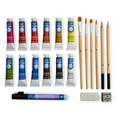 an assortment of art supplies including paint, pencils and markers