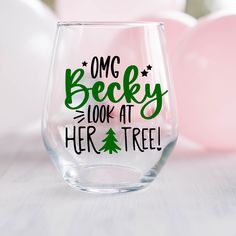 a wine glass that says omg becky look at her tree