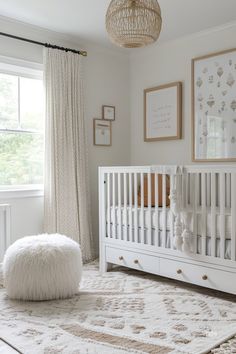 Neutral cozy nursery with white crib, mixed wood nursery furniture, and natural tones. Beige and brown accents create a calm, elegant nursery feel. Chic Nursery, Smart Organization, Sleek Furniture