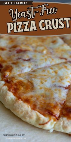 a close up of a pizza on a table with the words yeast - free pizza crust