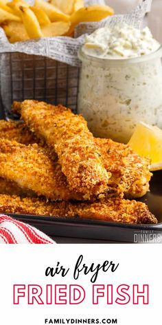 air fryer fried fish on a plate with fries and coleslaw in the background