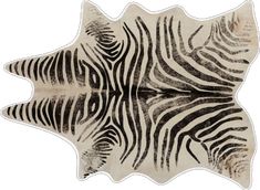 a black and white zebra print on the back of a cow skin area rug,