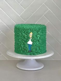 Green cake with homer simpson hiding in bush made of frosting Homer Cake The Simpsons, Homer Simpson Cake Birthdays, Simpsons Cake Birthday, Simpson Cake Ideas, Funny Cake Ideas For Men, Simpson Birthday Party Ideas, Funny Cakes For Men, Homer Simpson Bush, Homer Cake