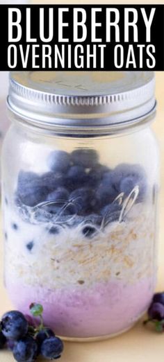 blueberry overnight oats in a mason jar with berries on the side and text overlay