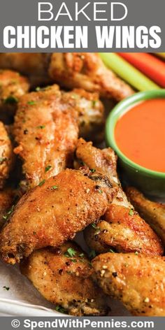 baked chicken wings with dipping sauce on the side