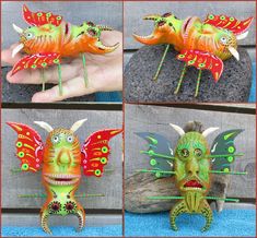 four different images of an orange and green dragon head with horns, wings, and eyes