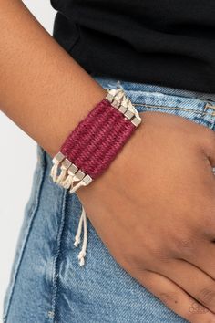 a close up of a person wearing a bracelet