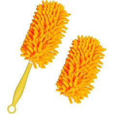 two yellow scrubbing brushes sitting on top of each other