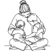 a woman holding a baby while sitting on the floor