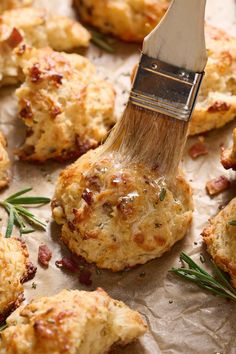 a close up of food with a brush in it