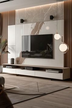 a living room with a large television on the wall