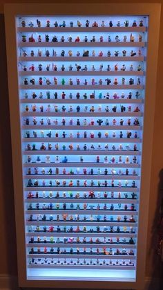 a large display case filled with lots of toy figurines