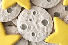 some yellow and white cookies with stars on them