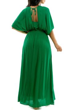 Flowy and chic, this maxi dress features a flattering smocked waist and split hem. 63" length (size Medium) V-neck Elbow-length sleeves Lined 100% rayon Dry clean Imported Elbow Length Sleeve, Split Hem, Smocking, Nordstrom, V Neck, Maxi Dress