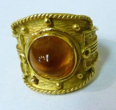 18kt yellow gold ring with a high cabochon citrine. Stone measures 9mm x 18mm and ring weighs 6.1 dwt (9.4 grams) Fits ring size 6-3/4 Pre owned age appropriate condition. Jupiter Fl, Cabochon Ring, Citrine Stone, Large Crystals, Yellow Gold Ring, Multi Stone Ring, Multi Stone, Yellow Gold Rings, Stone Rings